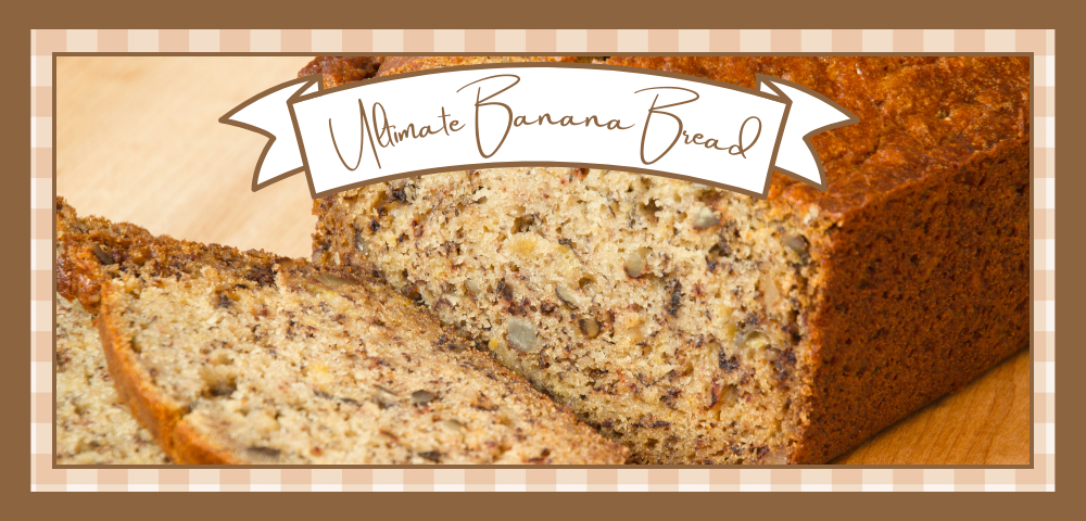 Loaf of banana bread with a slice taken from it.