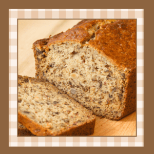 Ultimate-Banana-Bread-Recipe | The Granite Acorn Loaf of banana bread with a slice taken from it