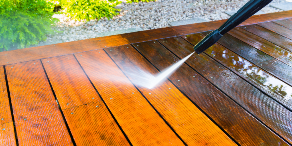 Exterior deck being power washed