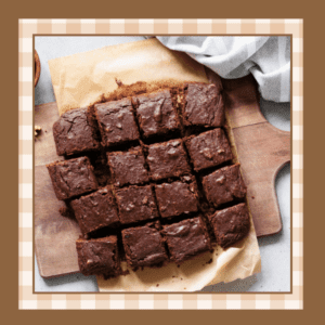 Cutting board with a batch of freshly made brownies