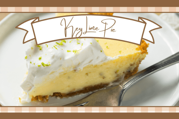 Slice of key lime pie on a white plate with a fork