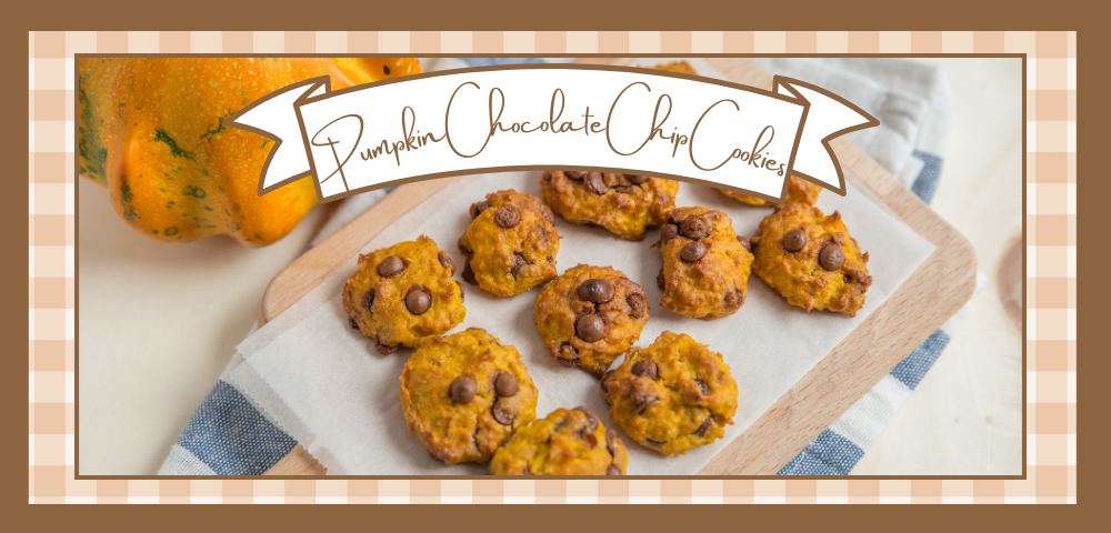 Cutting board with a batch of pumpkin chocolate chip cookies