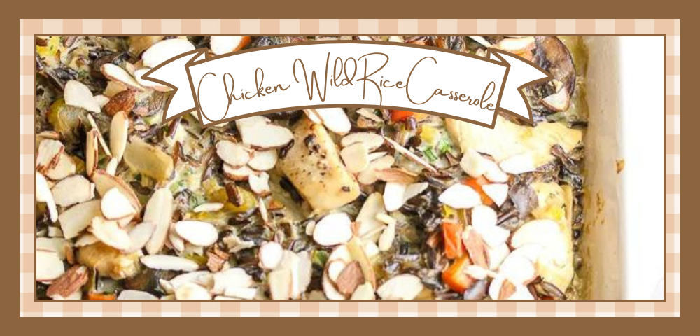 Chicken-Wild-Rice-Banner | The Granite Acorn Closeup of a dish of chicken wild rice casserole topped with sliced almonds