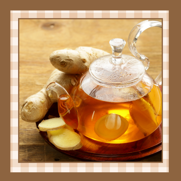 Clear tea pot of ginger tea