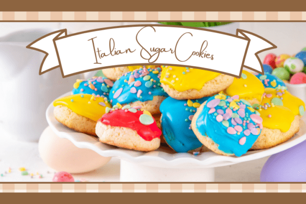 White footed display plate filled with italian sugar cookies