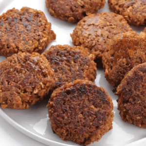 White plate with vegan breakfast sausage patties