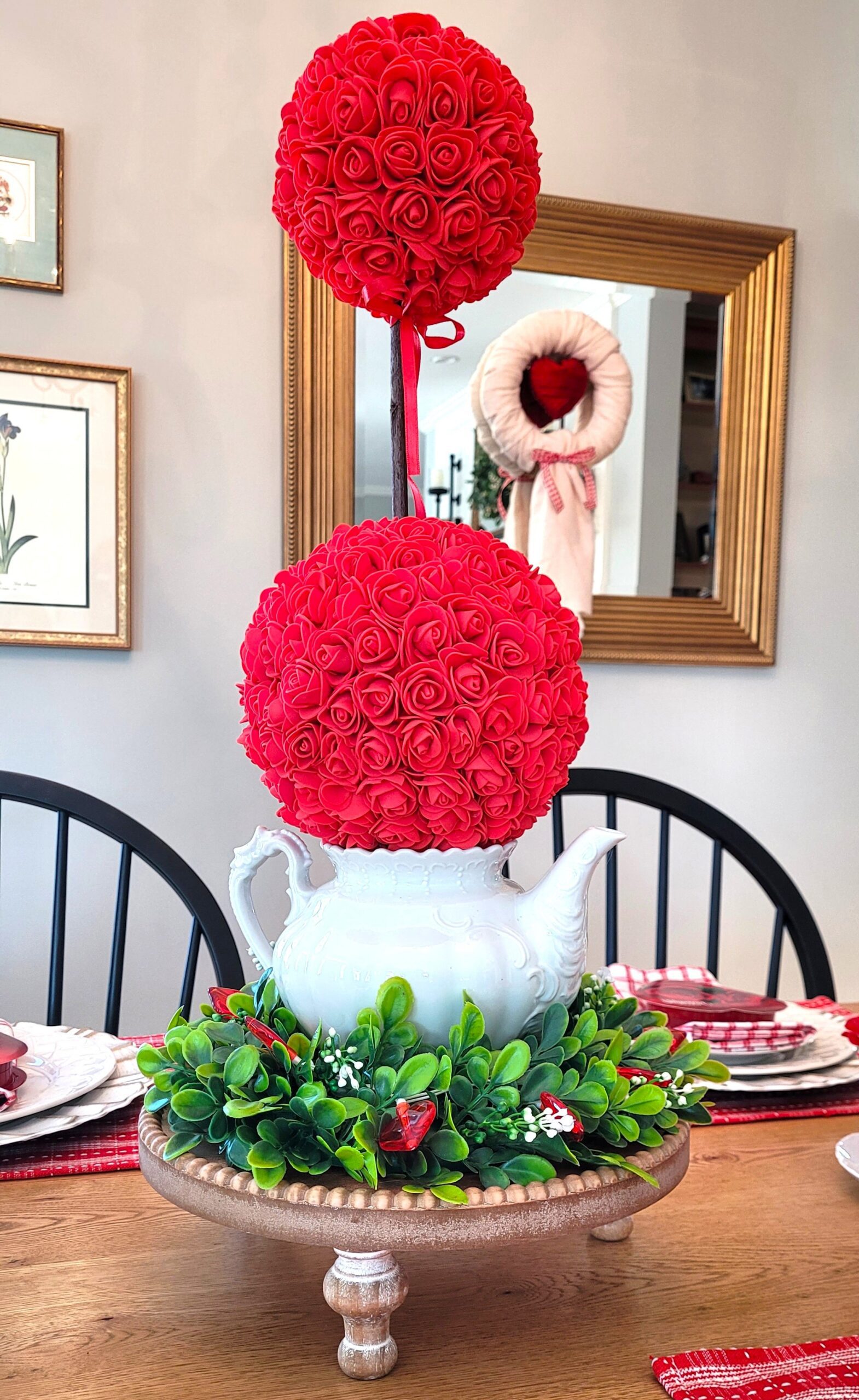 Double ball rose covered topiary in a white tea pot